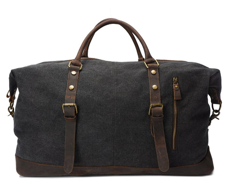 Dark gray canvas and leather weekend bag with adjustable shoulder strap, sturdy top handles and inner lining