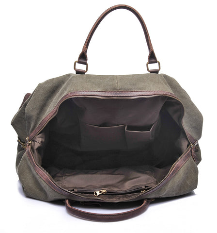 Green canvas and leather weekend bag with adjustable shoulder strap, sturdy top handles and inner lining