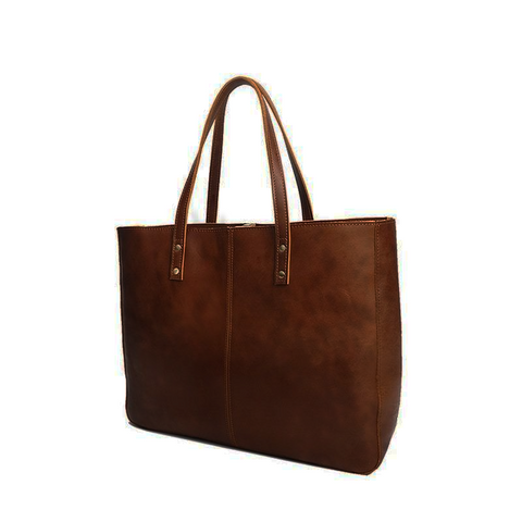 Handmade brown 100% top-grain genuine leather tote bag with two inner zippered pockets and inner lining.