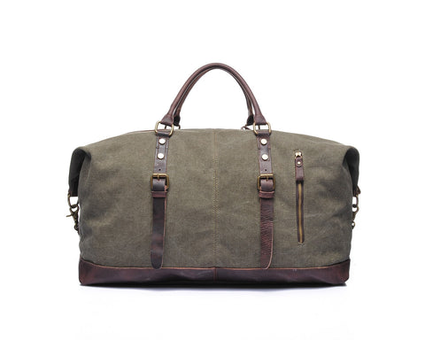 Green canvas and leather weekend bag with adjustable shoulder strap, sturdy top handles and inner lining