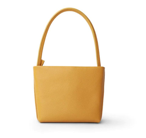 Handmade waterproof yellow top-grain genuine leather tote for women with inner pocket and inner lining.
