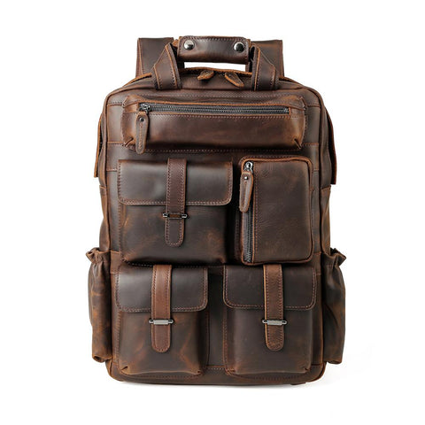 Handmade dark brown full grain cow genuine leather travel backpack bag with laptop compartment, many front pockets and adjustable shoulder strap.
