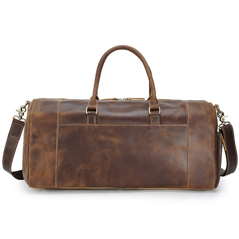 Brown large duffel leather bag with zippered pockets, adjustable shoulder strap and shoe compartment
