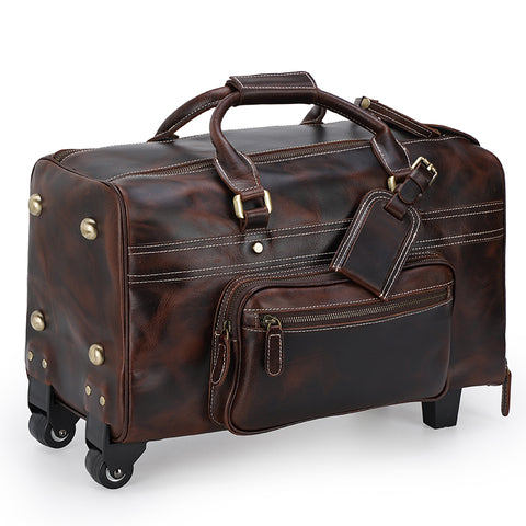 Brown high-end top-grain genuine leather weekender duffel luggage bag with laptop compartment and adjustable shoulder strap with buckle detail and sturdy top handles