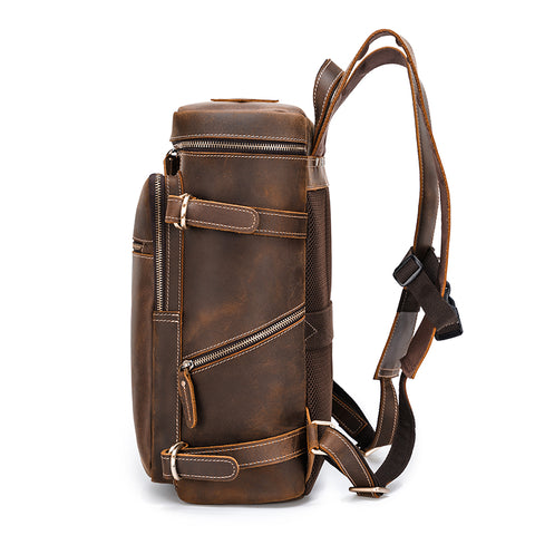 Water-resistant brown vintage Leather Backpack with back panel made of suspended mesh.
