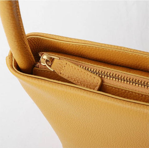 Handmade waterproof yellow top-grain genuine leather tote for women with inner pocket and inner lining.