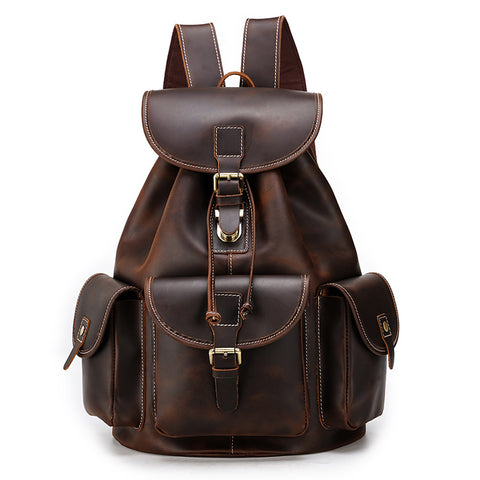 Handmade water-resistant dark brown genuine leather laptop backpack bag with large inner compartment an outer pockets.