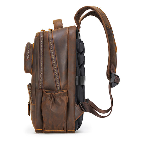 Handmade water-resistant brown full grain genuine leather backpack bag with laptop compartment, many large pockets and breathable back panel.