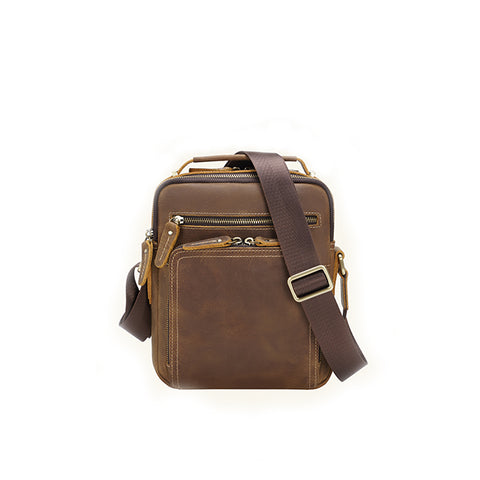 Brown cross body shoulder messenger full grain cow leather bag with adjustable shoulder strap, 2 compartments and many pockets.