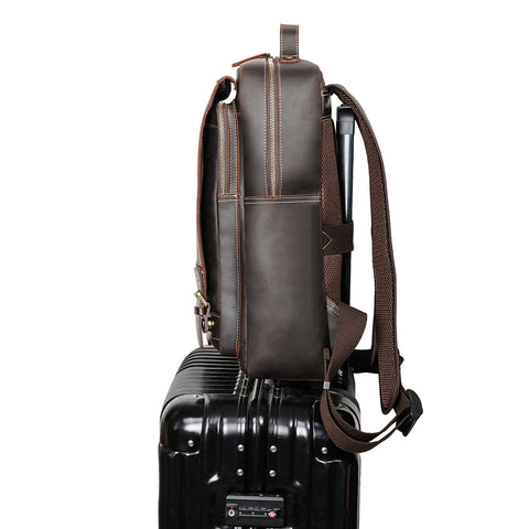 Handmade dark brown full grain cow genuine leather backpack with laptop compartment, many zippered pockets and pen loop.