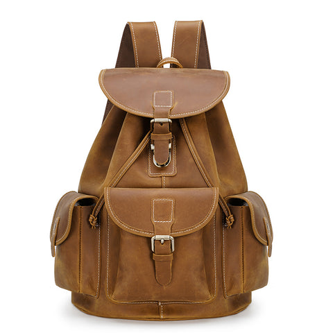 Handmade water-resistant light brown genuine leather laptop backpack bag with large inner compartment an outer pockets.